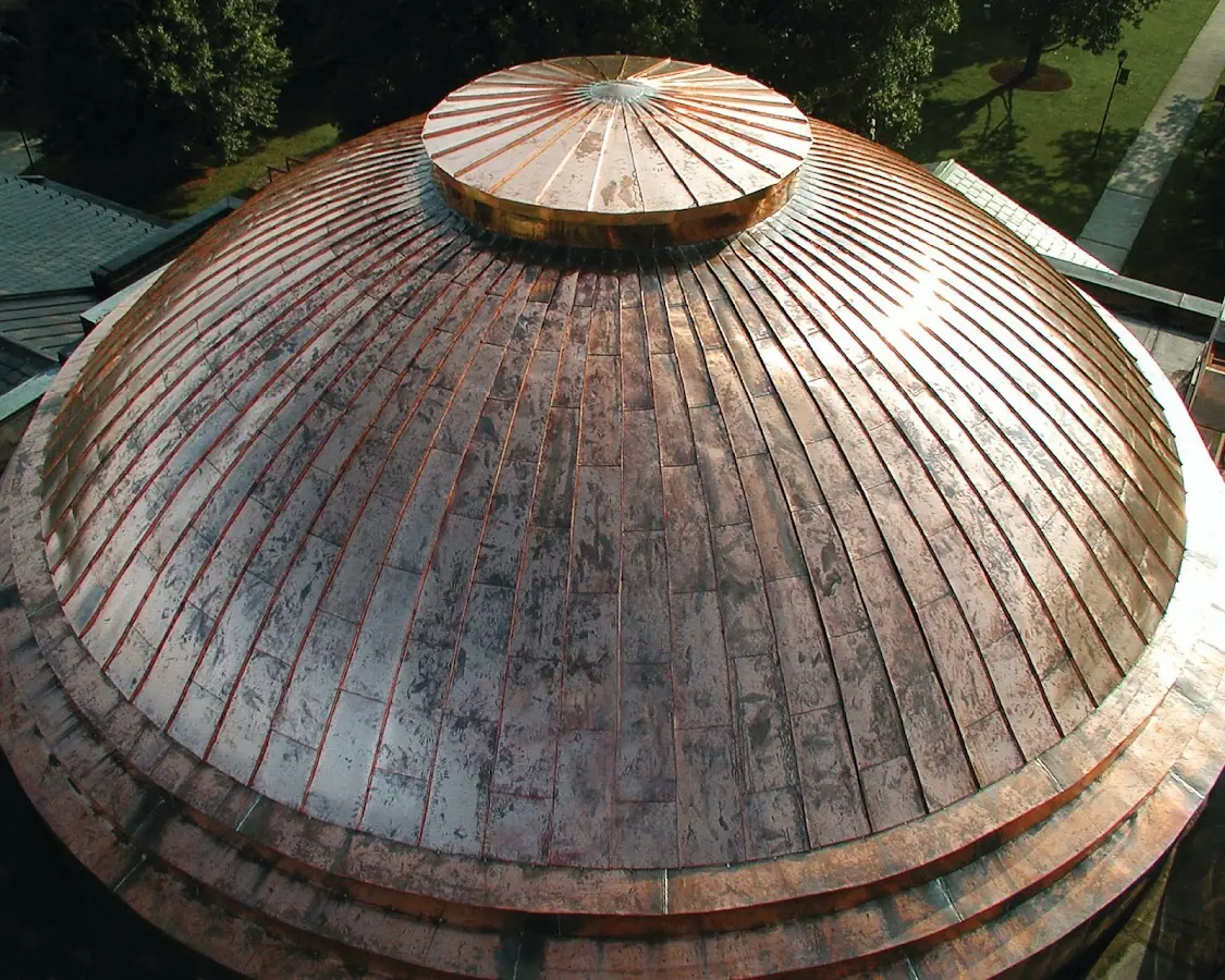 Craftsman Roofing crew installing a new roof in Mattapoisett